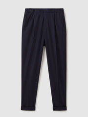 Relaxed-Fit Pleated Tapered Trousers Navy | Mens