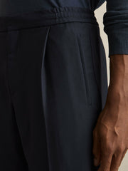 Relaxed-Fit Pleated Tapered Trousers Navy | Mens